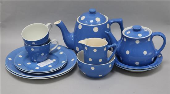 A blue polka dot tea service